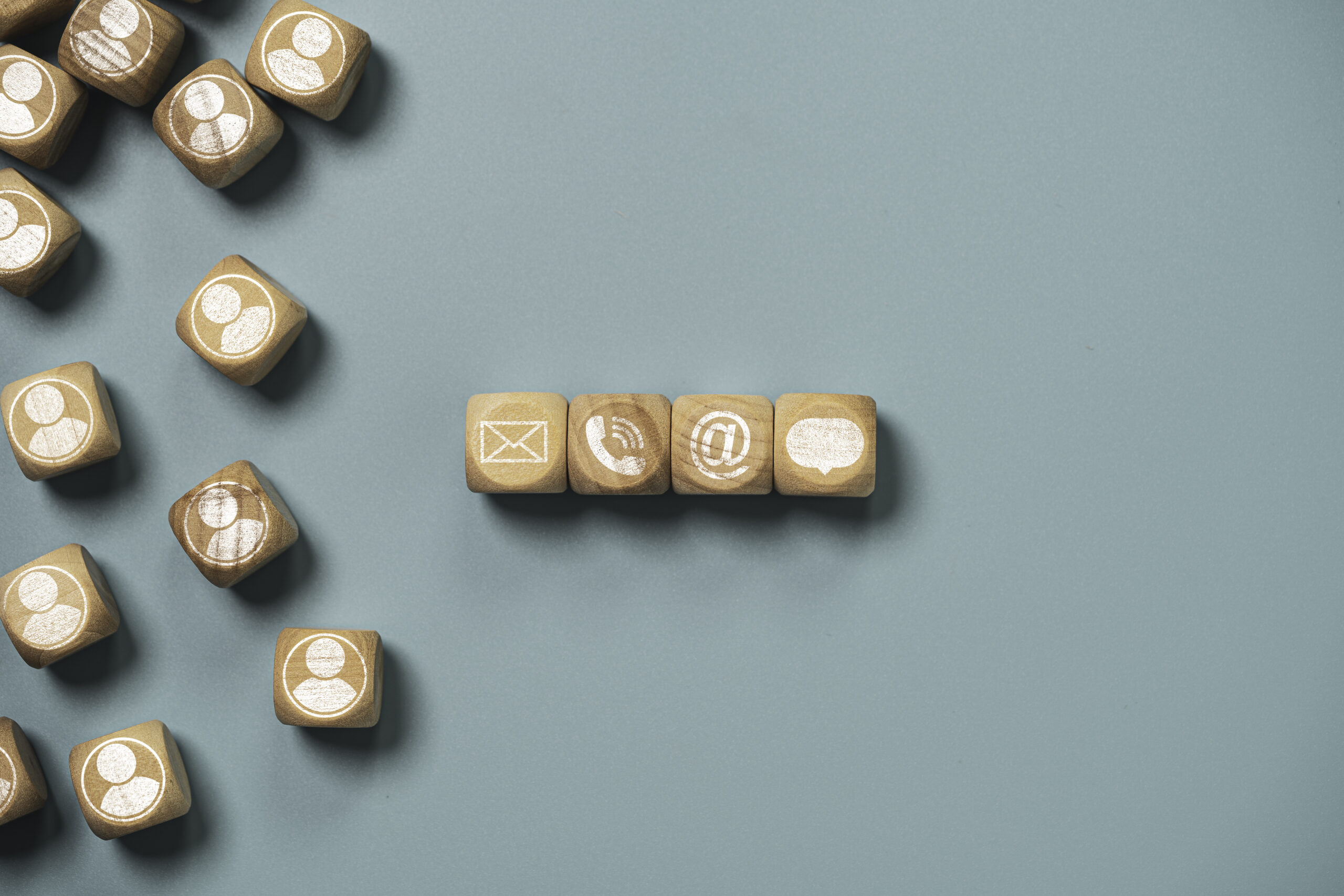 Customer service and business contact concept, wooden cube block Customer service and business contact concept, wooden cube block which print screen letter , telephone email address and message.